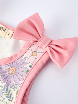 Girls pink floral sleeveless vest top and shorts set, angle 4 view, perfect summer outfit for toddlers.