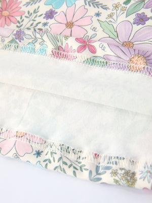 Girls pink floral sleeveless vest top and shorts set, stylish outfit for toddlers, angle view 5.