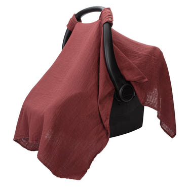 Baby car seat cover in wine color, stylish and protective for infants. Perfect for car seat safety and comfort.