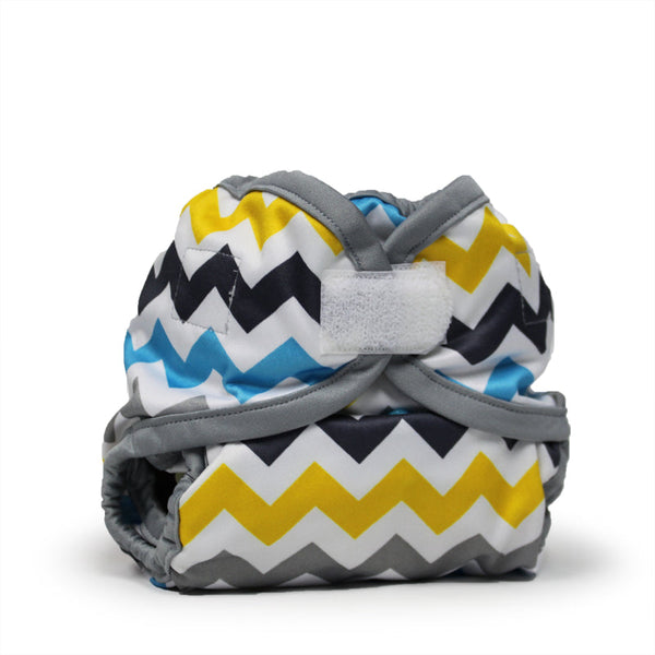 Rumparooz Newborn Cloth Diaper Covers in Charlie design, angle 3 view, perfect for bedding and sleep needs.