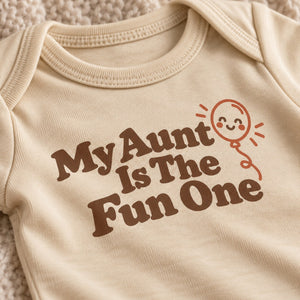 Close-up of the My Aunt Is The Fun One baby bodysuit print