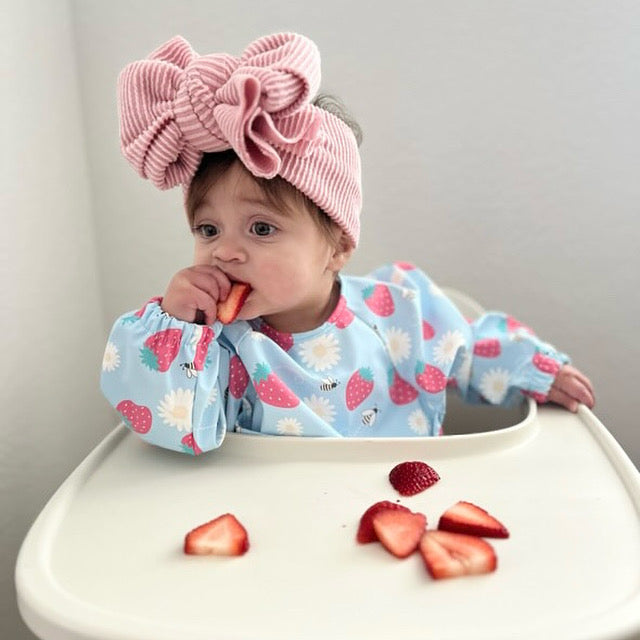 Grayson Long Sleeve Bib in Strawberry Patch design, perfect for mess-free mealtime fun for babies.