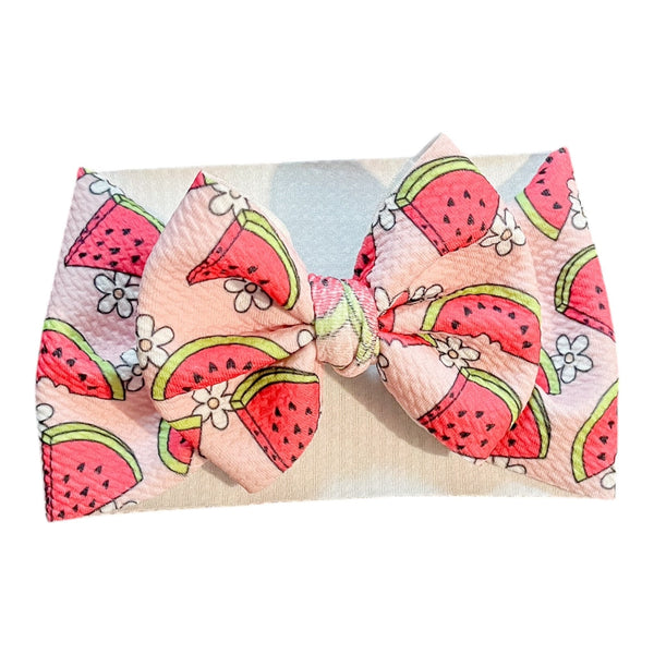 Watermelon Floral Baby Bow - Cute accessory for seasonal wear, perfect for little ones' outfits.