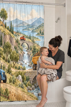 Mom holding her baby on the tub edge next to the Vehicle Landscape shower curtain