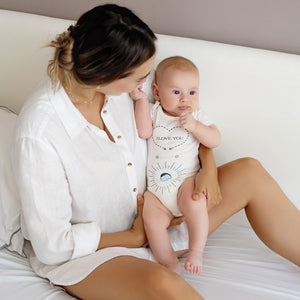 "Massage Me! Onesie for babies 0-6 months, featuring a playful design, perfect for comfort and style."