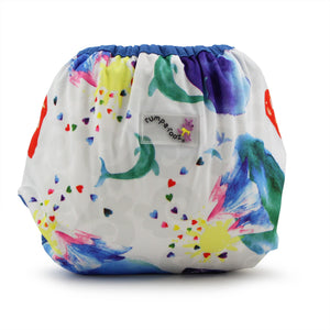 Rumparooz Newborn Cloth Diaper Covers in Lava color, angle view 3, perfect for bedding and sleep.