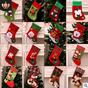 Santa Claus socks with Christmas tree pendant, perfect festive decoration for holiday celebrations.