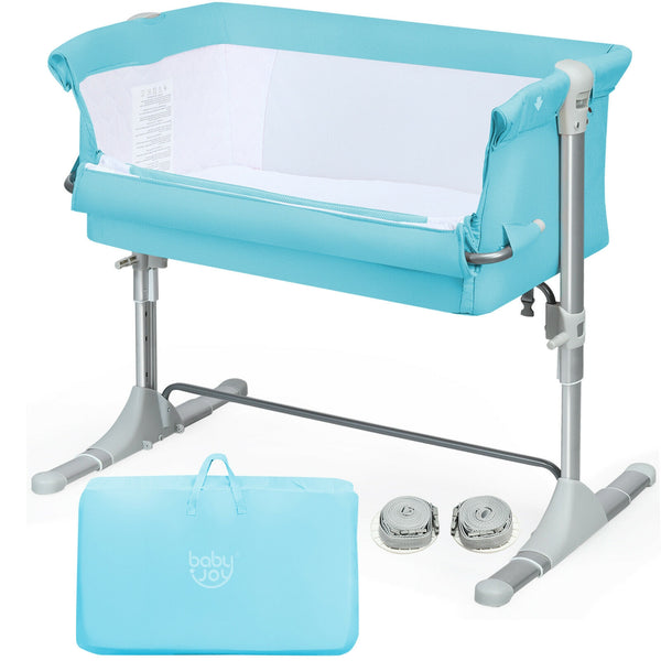 Portable baby bed side sleeper bassinet crib with carrying bag, angled view for travel convenience.