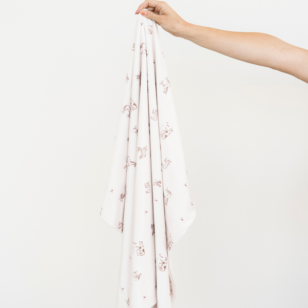 Minky stretch receiving blankets in a cozy 45-degree angle, perfect for swaddling and keeping your baby warm.