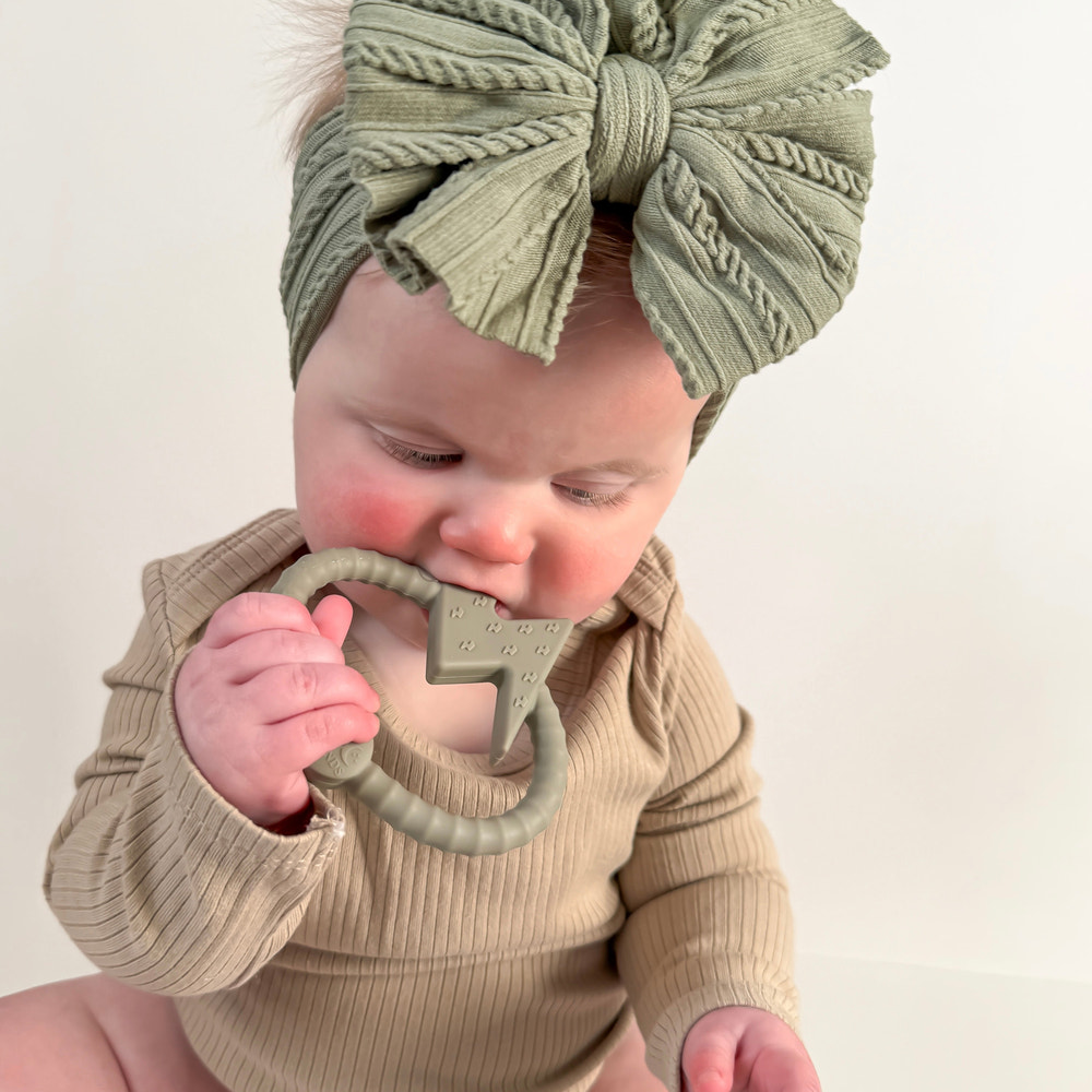 BOLT Silicone Sensory Teether in vibrant colors, perfect for soothing baby's gums and enhancing sensory play.