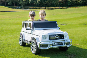 24V 4x4 Mercedes Benz G63 AMG ride-on car for kids, angle view showcasing its sleek design and spacious 2-seater.