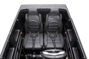 24V Mercedes Benz G63 AMG 4x4 ride-on car for kids, 2-seater, angled view showcasing its sleek design and features.