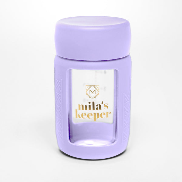 Set of 2 glass breast milk bottles at angle 58, perfect for safe breast milk storage.