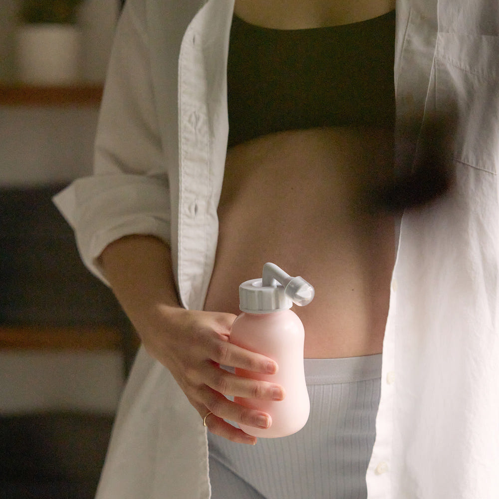 "Peri bottle for postpartum wellness, designed for gentle cleansing and comfort after childbirth."