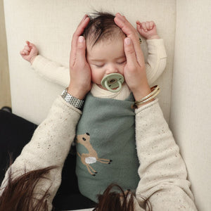 Luxury cotton deer knit swaddle baby blanket in angle 11 view, perfect for cozy and stylish baby comfort.