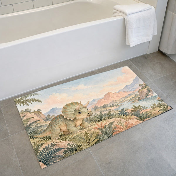 Baby Triceratops Dinosaur bath mat on the floor in front of the tub