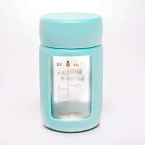 Set of 2 glass breast milk bottles at angle 51, perfect for safe and stylish breast milk storage.
