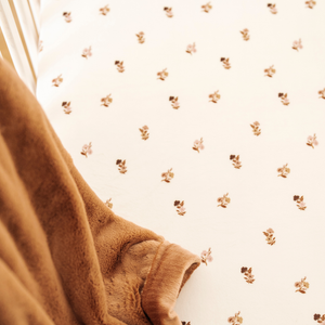 Minky Stretch Luxe Crib Sheets in soft fabric, angled view showcasing stylish design and comfort for babies.