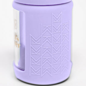Set of 2 glass breast milk bottles at a 60-degree angle for safe and stylish milk storage.