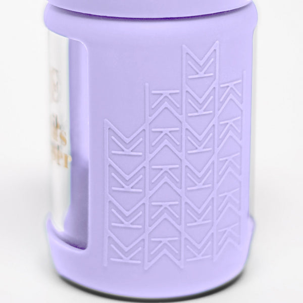 Set of 2 glass breast milk bottles at a 60-degree angle for safe and stylish milk storage.