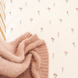 Minky Stretch Luxe Crib Sheets in soft fabric, angled view showcasing stylish design and premium quality for baby comfort.