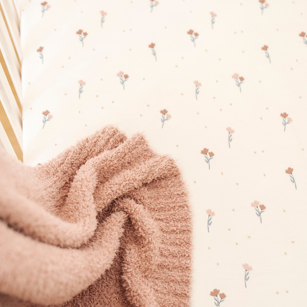 Minky Stretch Luxe Crib Sheets in soft fabric, angled view showcasing stylish design and premium quality for baby comfort.