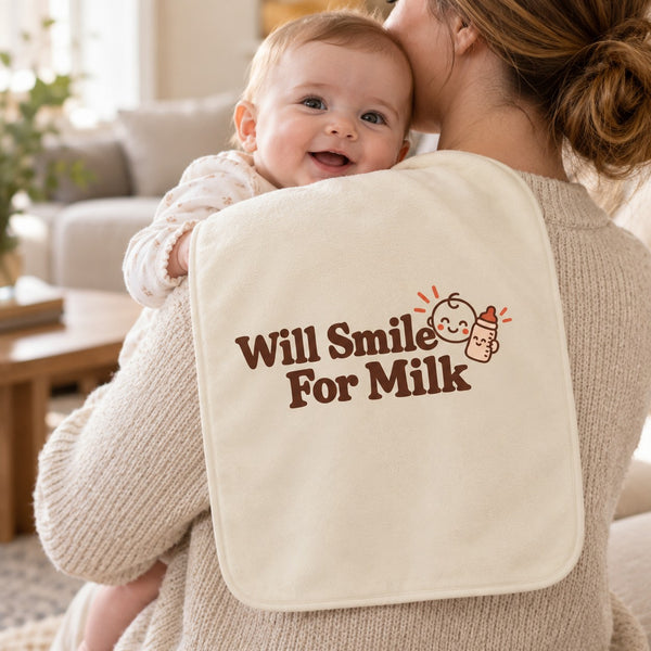 Will Smile For Milk burp cloth in cream, styled photo 1