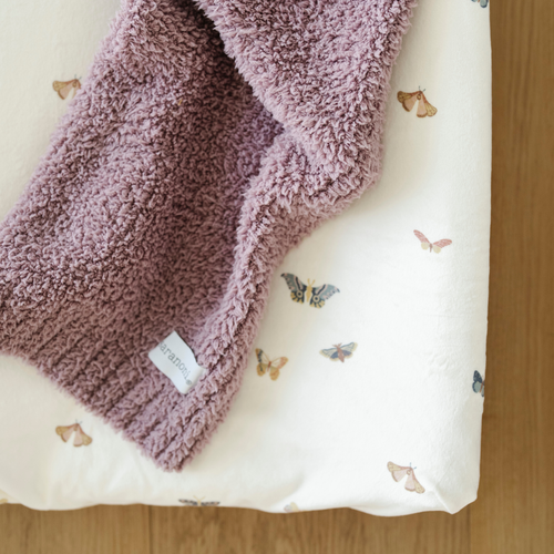 Minky Stretch Luxe Crib Sheets in soft fabric, perfect for a cozy and stylish nursery.