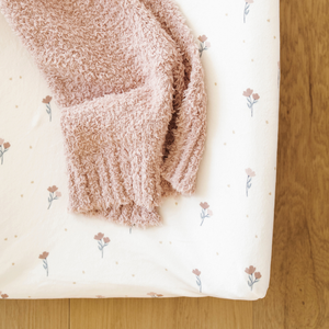Minky Stretch Luxe Changing Covers in vibrant colors for stylish and comfortable baby changing experiences.