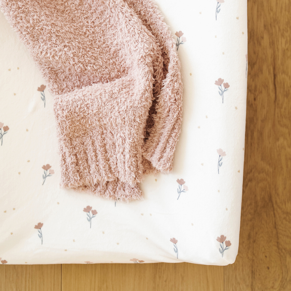 Minky Stretch Luxe Changing Covers in vibrant colors for stylish and comfortable baby changing experiences.