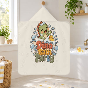 Dino Bath Party kids hooded bath towel hanging in a kids bathroom