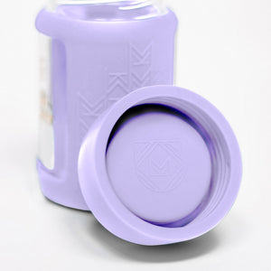 Set of 2 glass breast milk bottles at angle 61, perfect for safe breast milk storage.