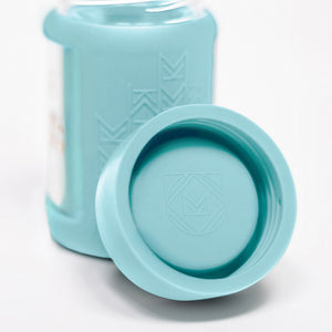 Set of 2 glass breast milk bottles at angle 53, perfect for safe breast milk storage.