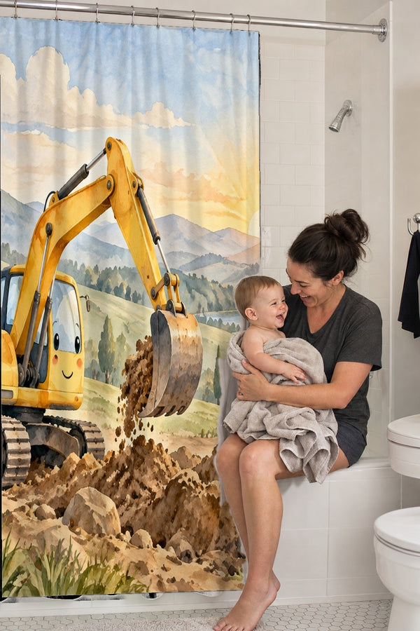 Mom holding her baby on the tub edge next to the Sunrise Excavator shower curtain