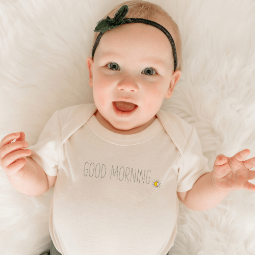 Short sleeve graphic bodysuit with "Good Morning" print for babies. Perfect for comfy, stylish everyday wear.
