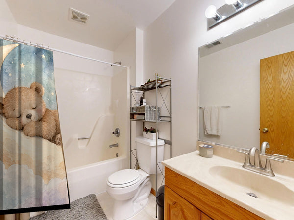 Moon Bear shower curtain on a tub shower combo in an American family bathroom