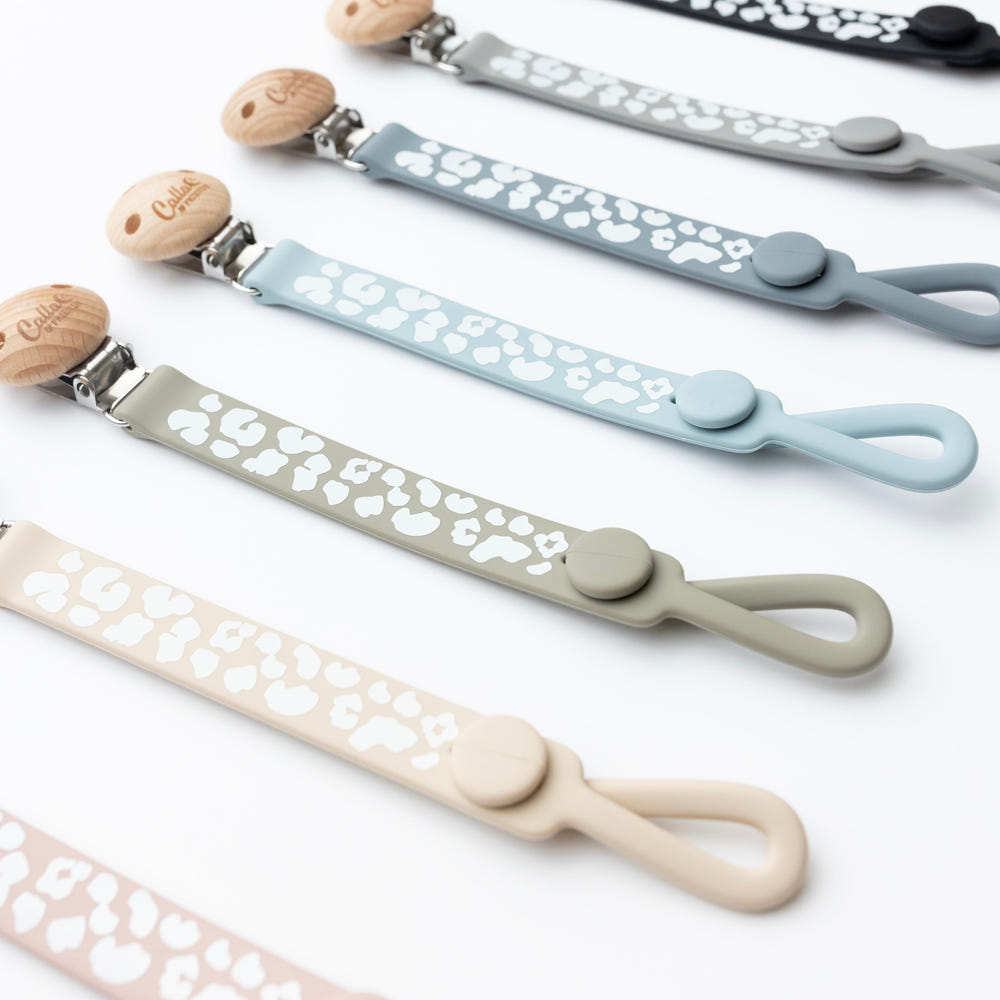 Nash Everything Clip in Leopard design - stylish and functional pacifier clip for babies.