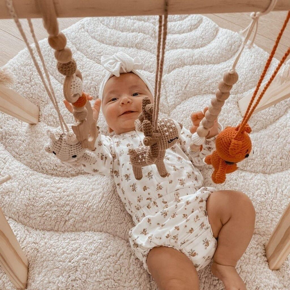 Handmade crochet toys for baby gym by Forest Family, perfect for playful and safe infant development.