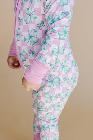 Bamboo Zip Romper in Shamrock & Bows design, showcasing a stylish angle view for babies.