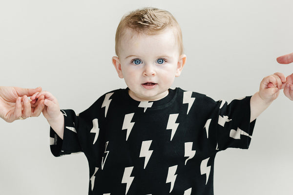 Black bolts shorts set for babies, stylish and comfortable, showcased from angle 5. Perfect for playful outings.
