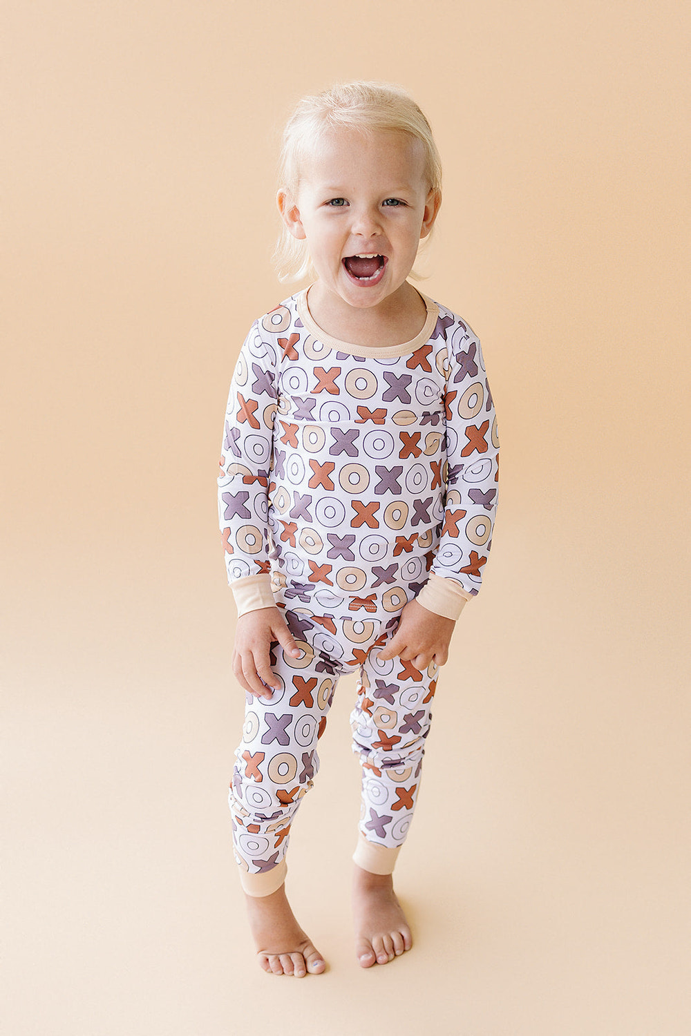Bamboo two-piece romper set for babies by Xoxo, featuring soft, breathable fabric and adorable design.