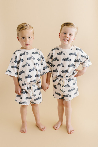 "Born to Ride baby shorts set featuring playful design for stylish little adventurers."