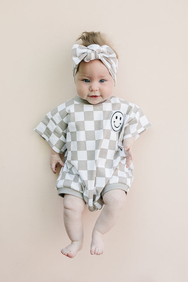 Short Sleeve Bubble Romper | Checkered Smiley Latte