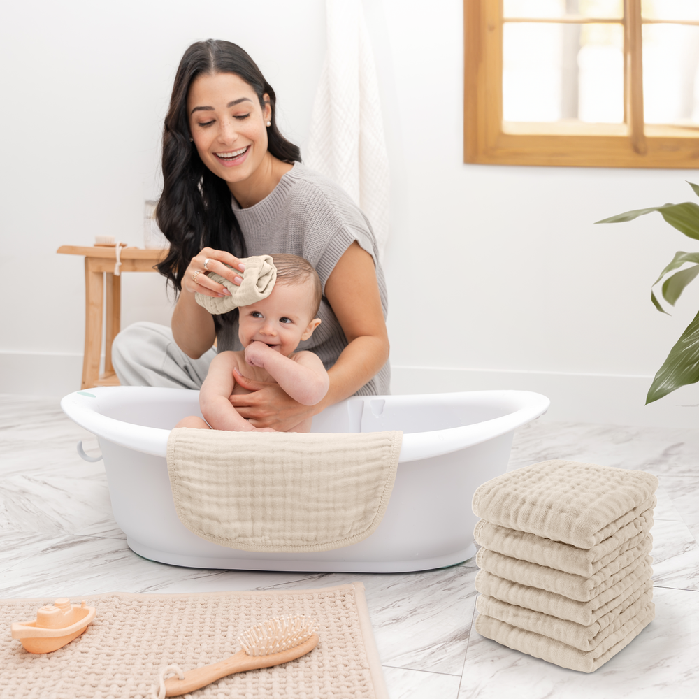 Soft sand-colored muslin washcloths for babies, perfect for gentle cleaning and comfort.