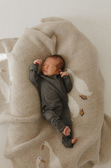 Bamboo zip pajamas in shadow color for babies, soft and breathable for comfortable sleep.