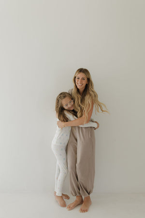 Bamboo two-piece pajamas for babies, featuring Autism Awareness design by Charli Counts, shown from angle 3.