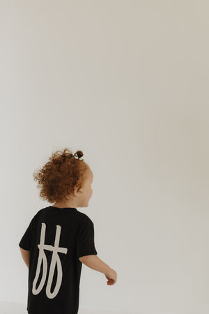 Toddler short sleeve bamboo lounge set in black, perfect for comfortable pajamas.