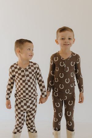Bamboo two-piece pajamas for babies by Giddy Up, featuring a cozy design and soft fabric.