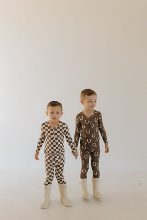 Bamboo two-piece pajamas for babies by Giddy Up, featuring a cute design and soft fabric.
