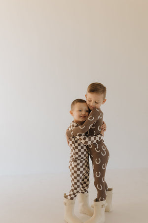 Bamboo two-piece pajamas for babies from Giddy Up, showcasing a cozy and stylish design at angle 7.